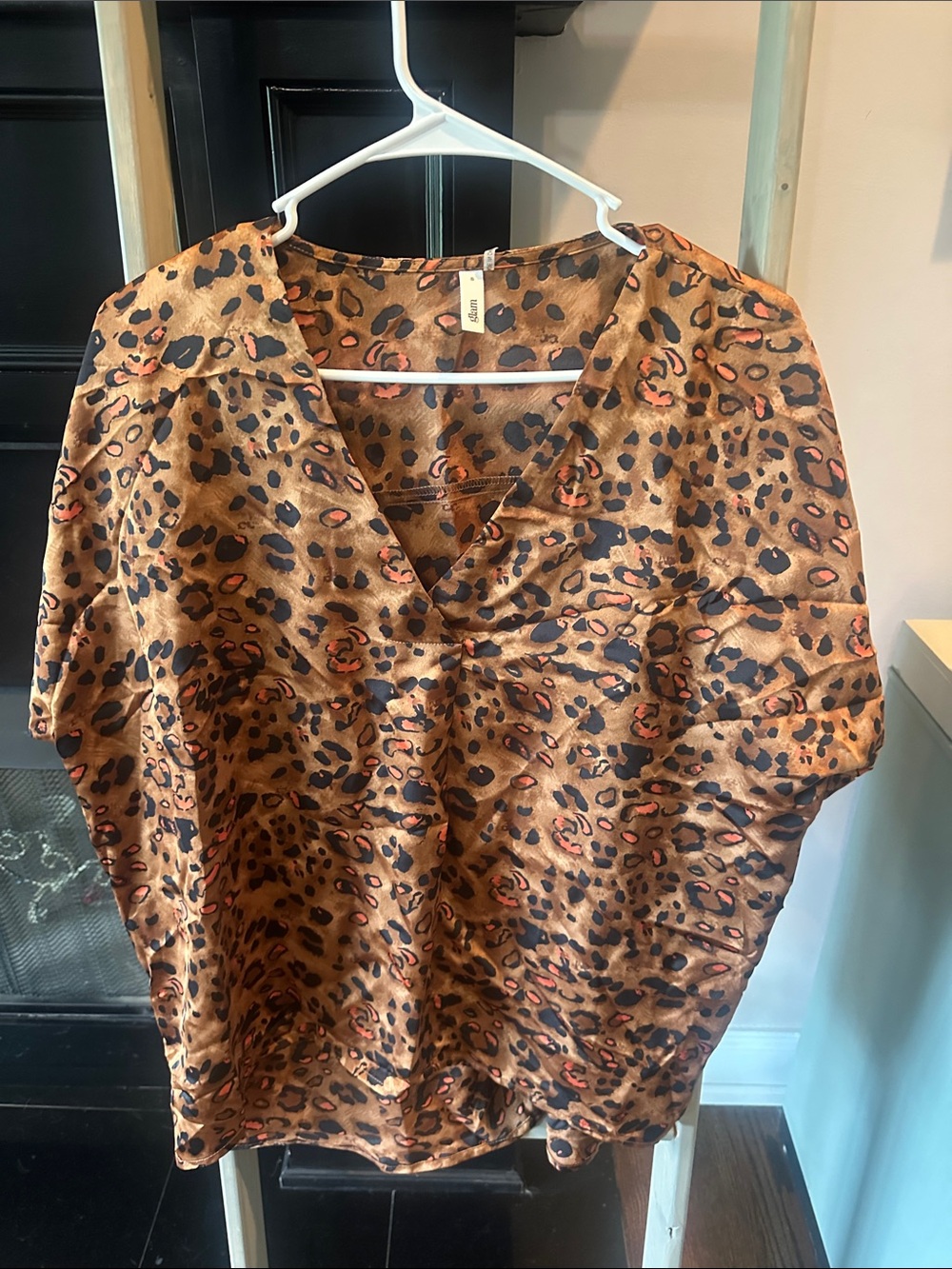 glam Leopard Print V-Neck Blouse in Brown and Black with Orange Accents
